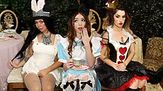 Myra is a stranger in a strange land after falling down a hole. In this wild land, everything is topsy-turvy and willy-nilly. Nothing makes any sense, and the characters are all looney. Myra stumbles upon Victor and Holly enjoying a tea party in the garden. It’s an unbirthday celebration, which is a new custom for Myra. The tea party is interrupted by Chanel, the queen.