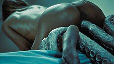 Things go from strange to worse as fleshy tentacles emerge from the darkness, slithering towards the frightened woman. That’s when the truth finally hits her.
