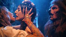 Ava emerges, breaking Lana free from her chains. She explains that she too is a sacrifice sent to be devoured by the Minotaur. Leading Lana through the endless pathways of the labyrinth, Ava proclaims that with the both of them together, they can escape the maze. Hope fills Lana’s eyes.