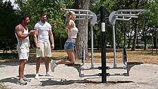 Gorgeous blonde Ria Sunn is walking through the park when she notices Lorenzo Viota and Deny Lou working out on the outdoor gym equipment. She approaches them and starts a conversation, complimenting them on their muscles. Ria asks to touch their biceps, and the guys seem really shy. She invites them back to her place to relax after their workout and although hesitant at first, she leads the way. When they arrive at Ria s apartment, this confident babe tries to get them to lighten up, letting both guys squeeze her perky tits. She strips off and lays on them before sucking a glass dildo with Lorenzo and Deny looking amazed! Ria lets them take turns to fuck her pussy and ass with her sex toy, then kneels between them to suck on their cocks! This salacious babe takes a pussy pounding from Deny while still slurping on Lorenzo s cock, then lets the guys switch places. After moving into her bedroom, rampant Ria gets all holes slammed, DP style and takes the shy guys spunk in her mouth to fin